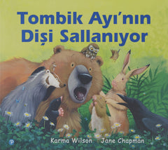 Tombik Ayi'nin Disi Sallaniyor